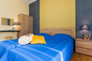 Postel nebo postele na pokoji v ubytování Private Central View rooms in Shared apartment near to Acropolis Metro Station