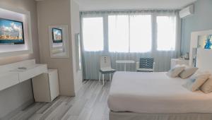 Cama ou camas em um quarto em Hôtel Josse