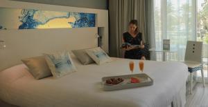 Cama ou camas em um quarto em Hôtel Josse