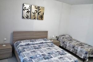 A bed or beds in a room at Yellowhouse