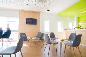 TV a/nebo společenská místnost v ubytování Laurus Motel Airport Tuzla