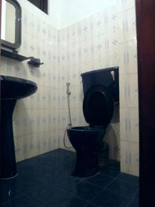 Koupelna v ubytování Hikka Urban Stay
