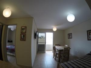 a room with a table and a dining room at Temporarios B & B in San Salvador de Jujuy