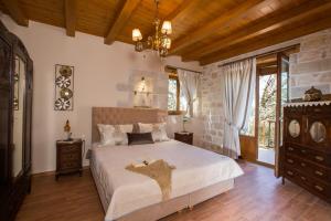 Ένα ή περισσότερα κρεβάτια σε δωμάτιο στο Vederi Estate +95 φωτογραφίες