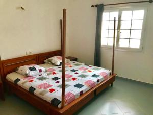 Postel nebo postele na pokoji v ubytování Dodoo Lodge
