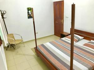 Postel nebo postele na pokoji v ubytování Dodoo Lodge
