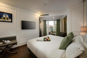 Televiisor ja/või meelelahutuskeskus majutusasutuses Hanoi Allure Hotel