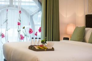 Voodi või voodid majutusasutuse Hanoi Allure Hotel toas