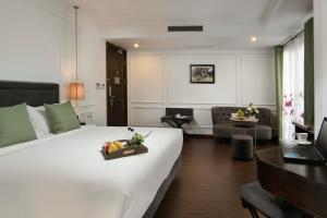 Voodi või voodid majutusasutuse Hanoi Allure Hotel toas
