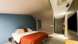 Letto o letti in una camera di Hotel ON