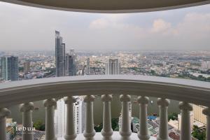 a view of the city from the balcony of a building at lebua at State Tower in Bangkok