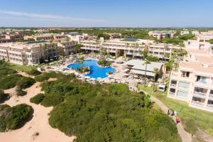 an aerial view of a resort with a pool at Hipotels Playa La Barrosa - Adults Only in Chiclana de la Frontera