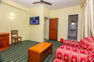 Televisor o centre d'entreteniment de Hotel Noble Inn花椒客栈