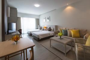 Giường trong phòng chung tại Kantary Hills Hotel, Chiang Mai
