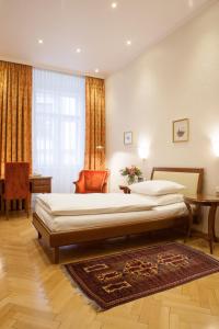Postel nebo postele na pokoji v ubytování Hotel Kaiserin Elisabeth