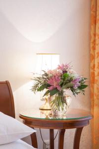 Postel nebo postele na pokoji v ubytování Hotel Kaiserin Elisabeth