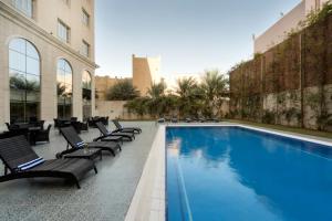 Bazén v ubytování Concorde Hotel Doha nebo v jeho okolí