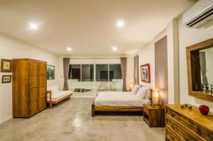 Giường trong phòng chung tại Casa Bellavista +25 ảnh