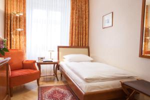 Postel nebo postele na pokoji v ubytování Hotel Kaiserin Elisabeth