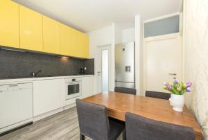 Kuchyň nebo kuchyňský kout v ubytování City Smart Apartment