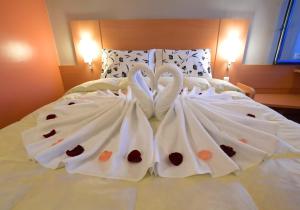 Letto o letti in una camera di Senator Hotel Tanger