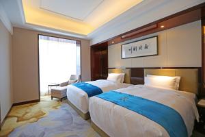 Katil atau katil-katil dalam bilik di Xi'an Lanxi International Hotel +32 gambar