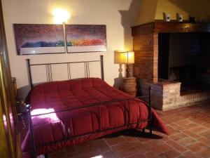 Krevet ili kreveti u jedinici u okviru objekta Podere Il Caggio Rooms