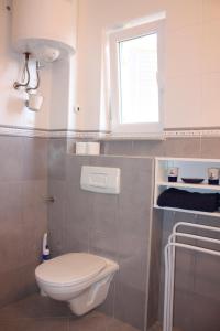 Vannituba majutusasutuses Apartments JTV Simuni