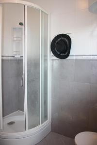 Vannituba majutusasutuses Apartments JTV Simuni