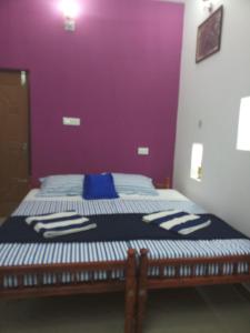 Postel nebo postele na pokoji v ubytování Angelann Homestay
