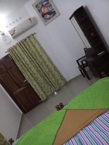 Postel nebo postele na pokoji v ubytování Angelann Homestay