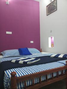 Postel nebo postele na pokoji v ubytování Angelann Homestay