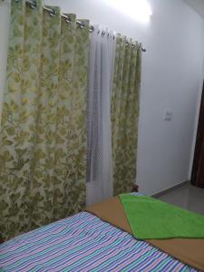 Postel nebo postele na pokoji v ubytování Angelann Homestay