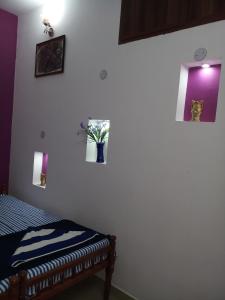 Postel nebo postele na pokoji v ubytování Angelann Homestay
