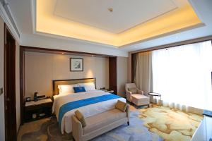 Katil atau katil-katil dalam bilik di Xi'an Lanxi International Hotel