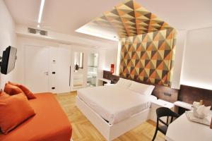 Кровать или кровати в номере Albergo Abruzzi