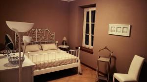 Ένα ή περισσότερα κρεβάτια σε δωμάτιο στο Agriturismo Corte Speranza