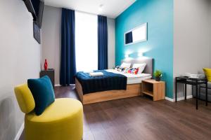 Posteľ alebo postele v izbe v ubytovaní Kings City - Sławkowska Apartments