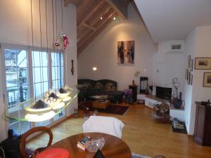 a living room with a couch and a table at Haus Gaschür in Bad Ragaz