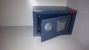 a black safe with the door open on a wall at Pension Pauly in Boppard