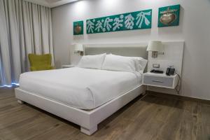 Satama Hotel客房内的一张或多张床位
