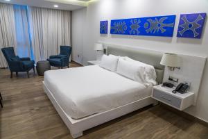 Satama Hotel客房内的一张或多张床位
