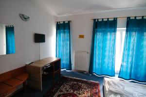 TV a/nebo společenská místnost v ubytování Hotel Ahrberg Viertel