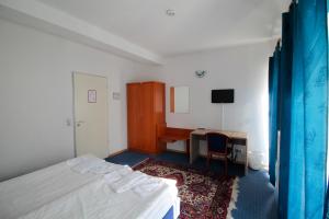 Postel nebo postele na pokoji v ubytování Hotel Ahrberg Viertel
