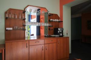 Kuchyň nebo kuchyňský kout v ubytování Hotel Ahrberg Viertel