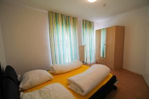Postel nebo postele na pokoji v ubytování Hotel Ahrberg Viertel