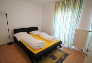Postel nebo postele na pokoji v ubytování Hotel Ahrberg Viertel