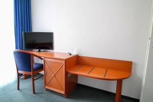 TV a/nebo společenská místnost v ubytování Hotel Ahrberg Viertel
