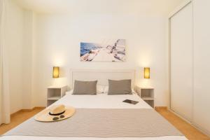 Säng eller sängar i ett rum på Pierre & Vacances Mojácar Playa