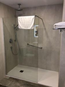 Koupelna v ubytování Hotel Valjunco